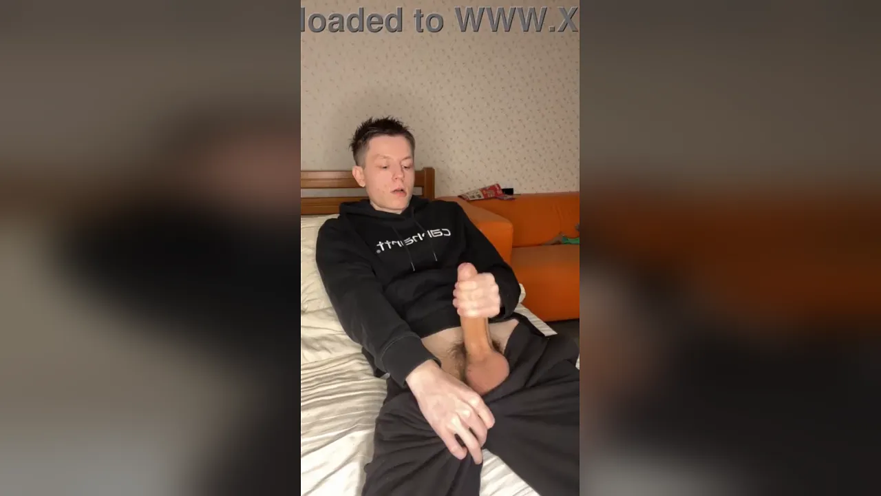 Gay twink Evgeny stretches his sore muscles and blue balls with a huge uncut cock