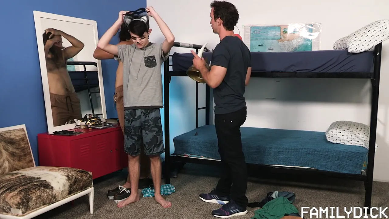 Two muscular hunks tie up a bareback twink before one creams his buddy