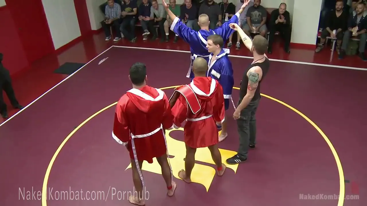 Gay group wrestling finale with muscular athletes in public