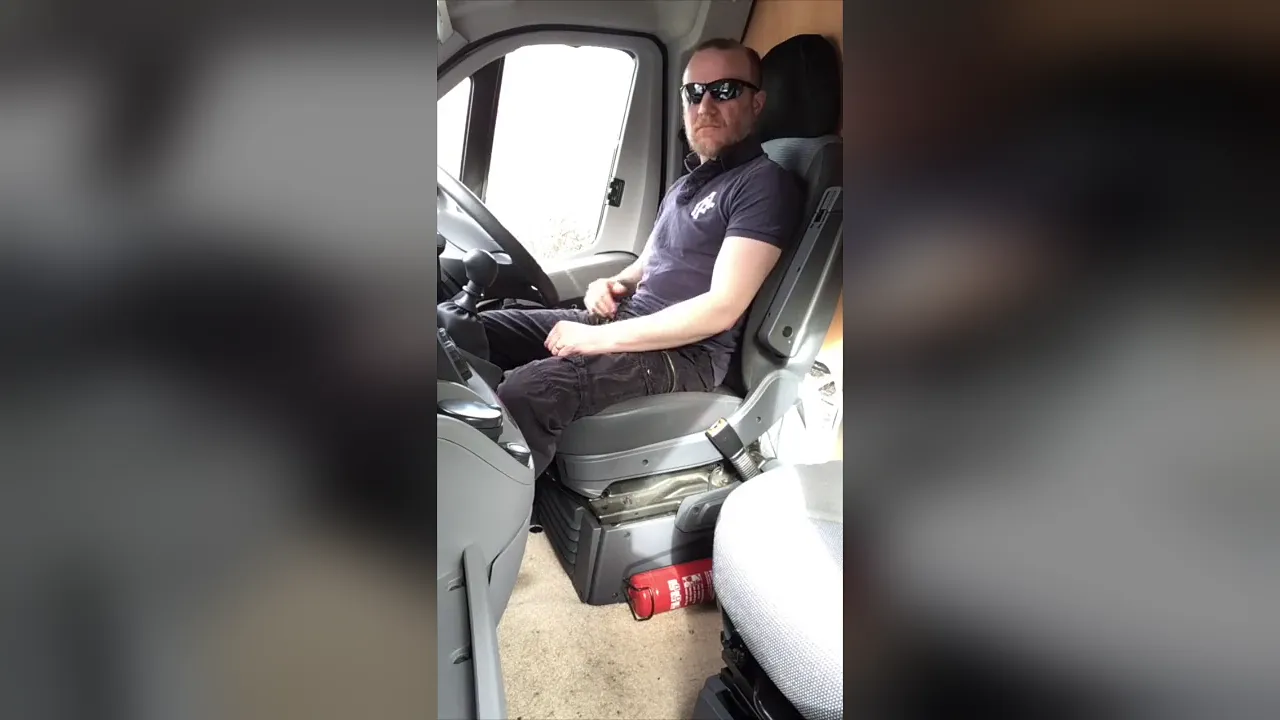 Muscular trucker masturbates and cums all over his shirt
