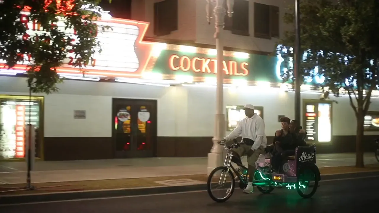 Twinks have rough bareback sex in the arcade after sucking each other's big dicks