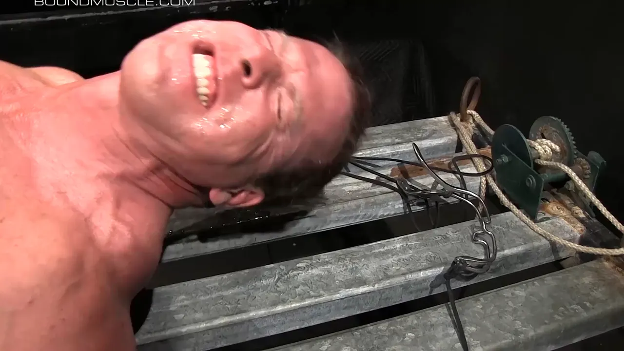 Muscular daddy Dire Callahan torments gay sub Derek Pains with uncut cock