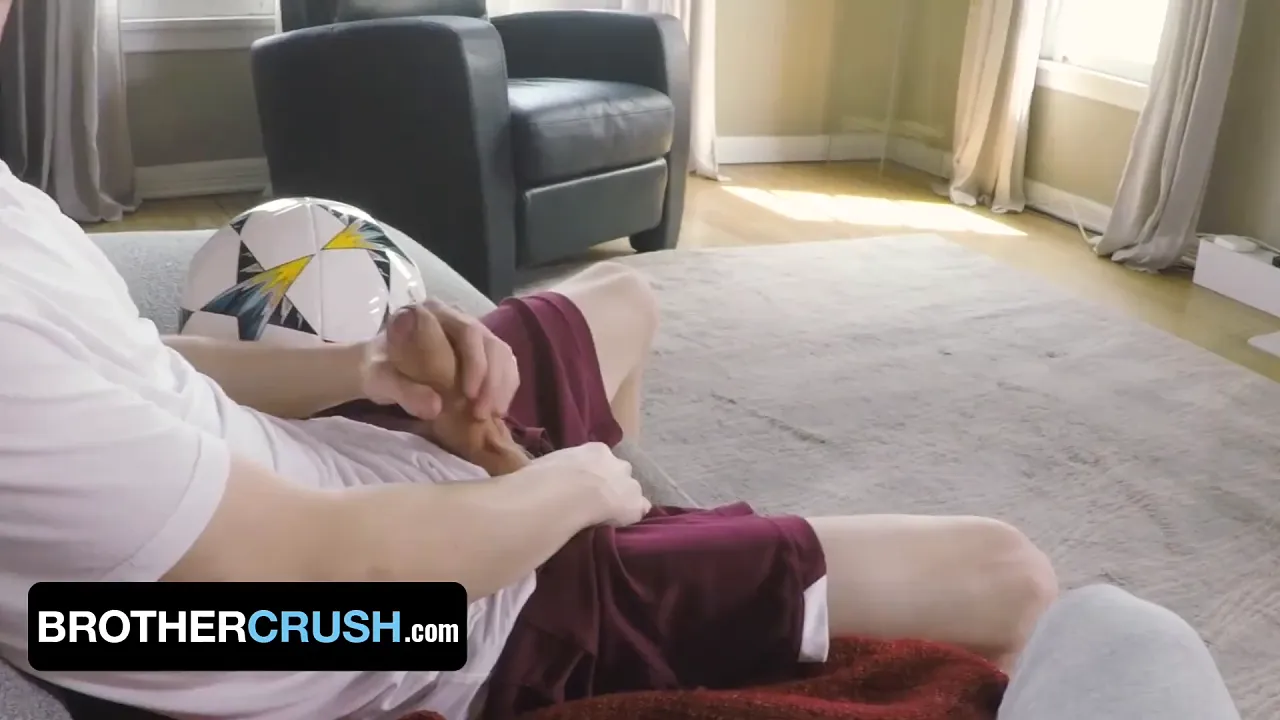 Hot stud stepsibling releases tension after soccer practice by cumming on his stepbro's