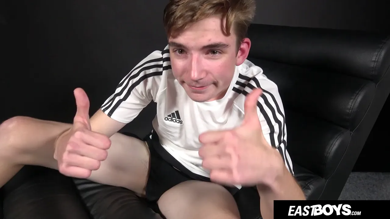Young gay twink masturbates with his uncut cock
