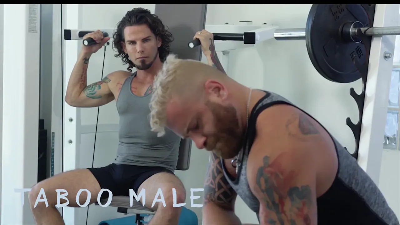 Gay muscle jocks Archer and Riley have bareback sex in the gym