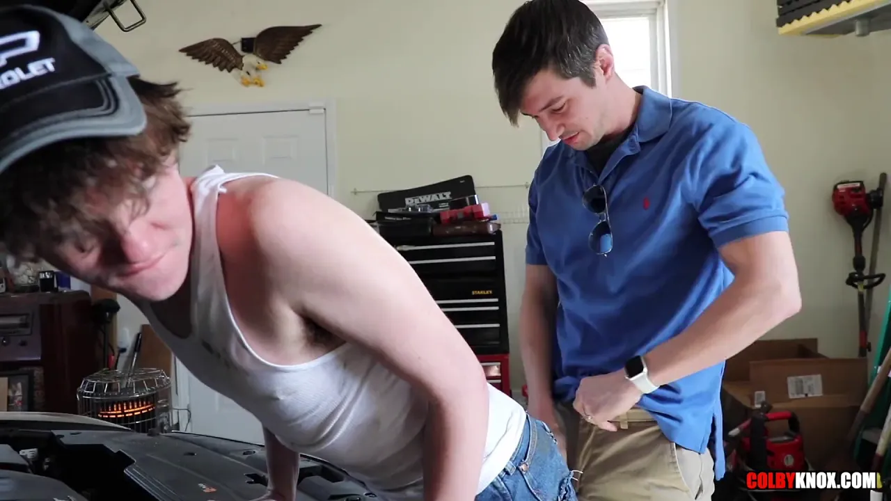 Colby Chambers fucks sexy gay muscle mechanic bareback in his Wranglers