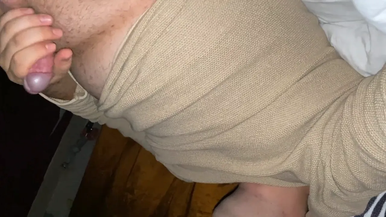 Gay man strokes chubby cock in POV handjob video