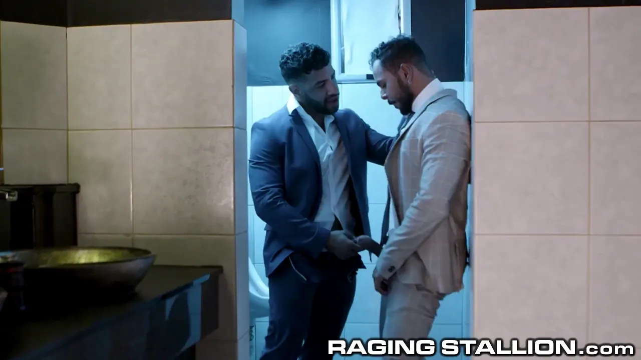 Two muscle hunks fuck bareback in the office bathroom