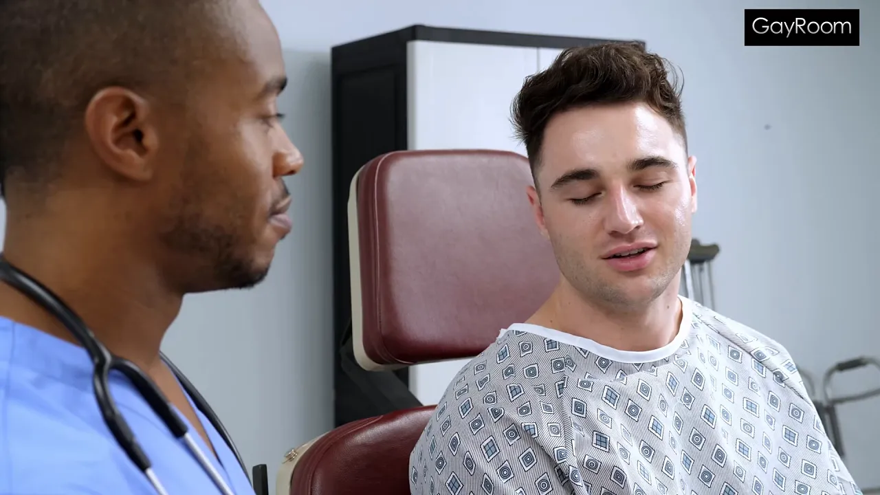 Gay doctor uses his big black cock to perform a rectal exam on hung stud Michael Boston