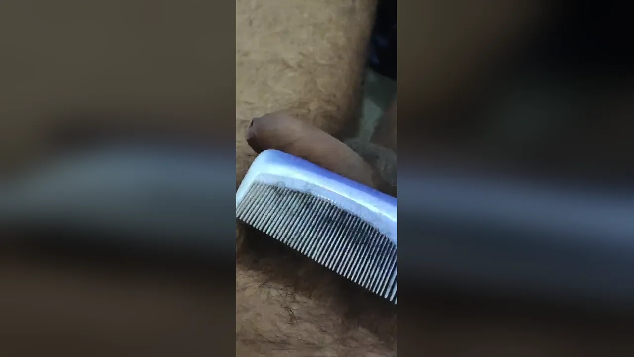 Solo gay boy with long uncut black-haired cock masturbates