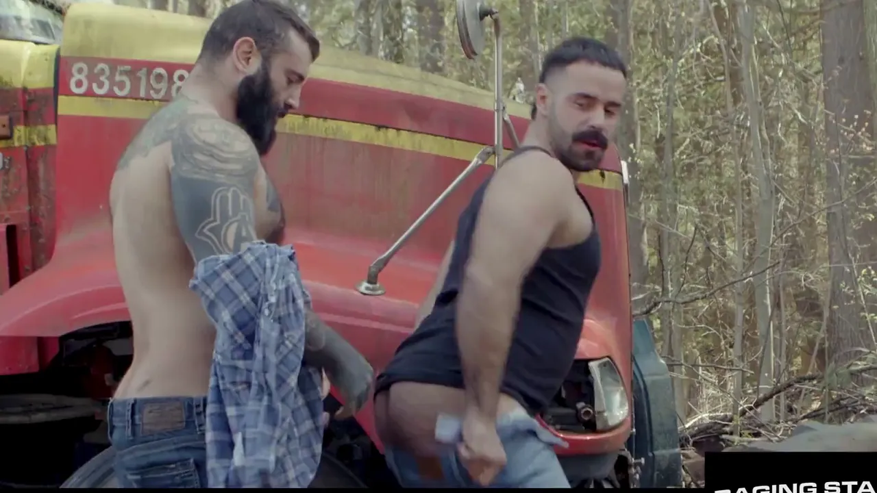 Gay muscle daddy truckers dominate and give blowjobs in RagingStallion