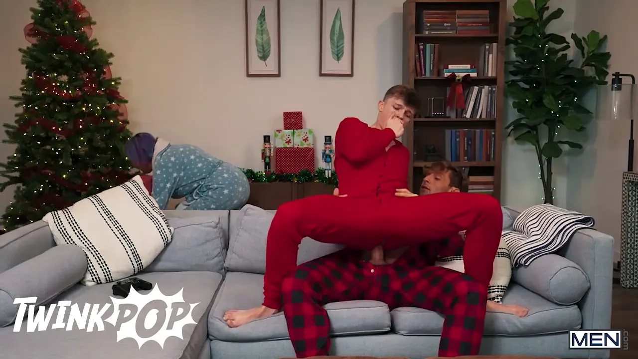 Gay twink Jake Preston blows and jerks Dom King's big cock while he plays video games on