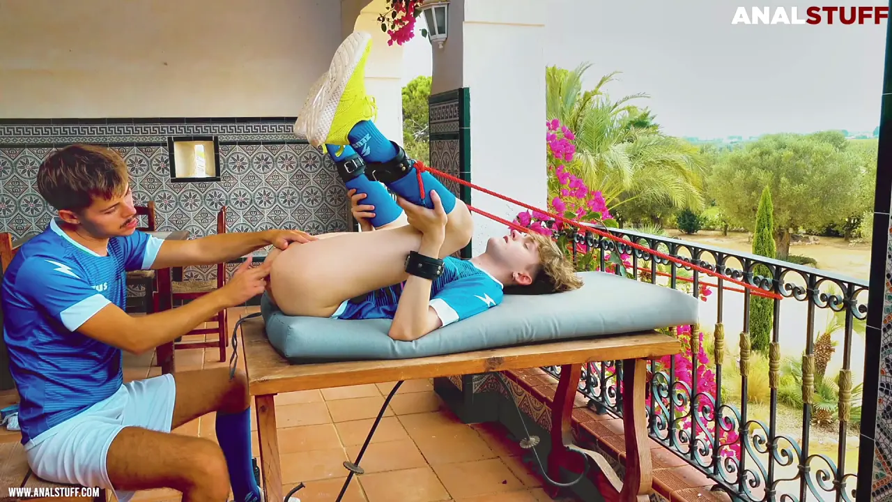 Gay twink with huge uncut cock dominates his submissive in sportswear