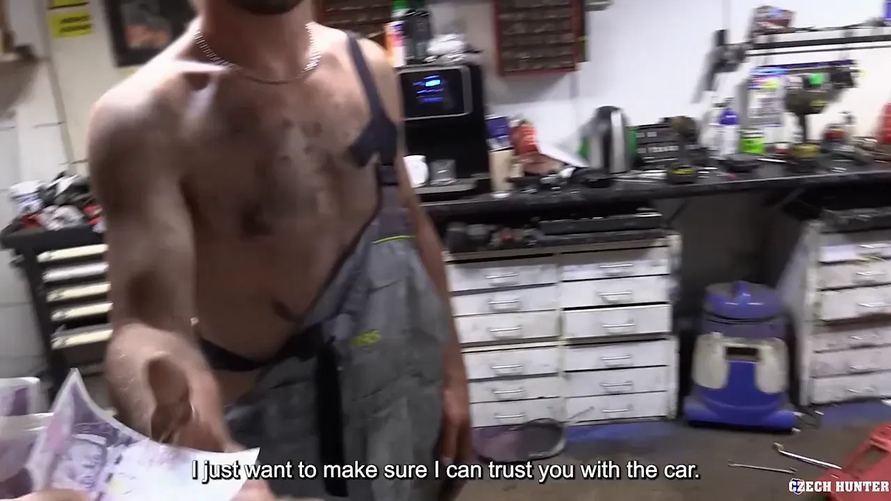 Euro mechanic gets down and dirty for a hookup in the repair shop