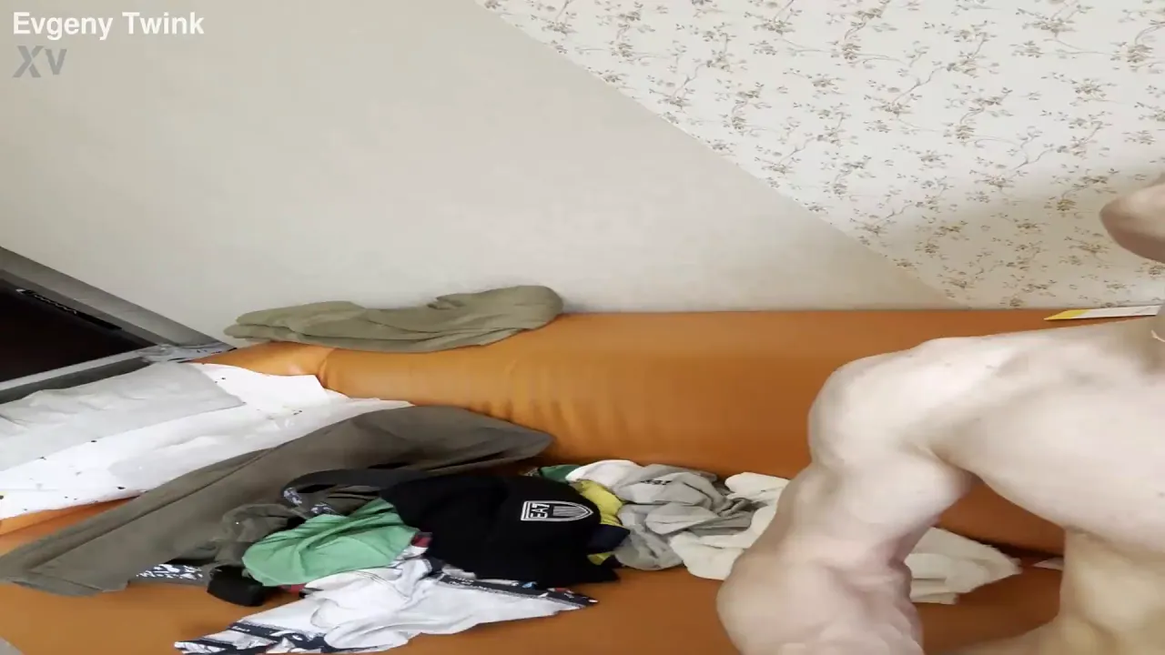 Evgeny Twink jerks off his huge cock until he shoots a big cumload