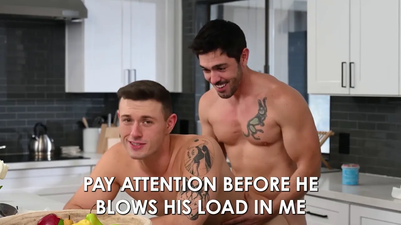 Muscular man takes his inked neighbor in the kitchen for bareback sex