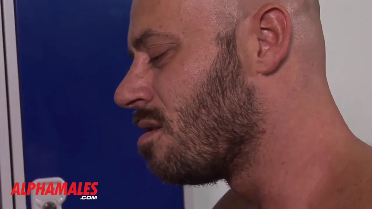 Gay muscle men jerk off together in the locker room